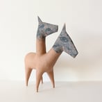 Horse, 2025, handbuilt stoneware, lithographic deco, pigments,h.43,5x14x40cm.