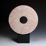 PB20-11-Red-yellow-and-black-ground-disc-on-stone-base-h.35-inc-basexd.26x8deep-base-TerraDelft