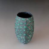 PB116-Grey-green-facetted-vessel-with-cloud-pattern-5-angle-h.23x12x12cm-s-TerraDelft