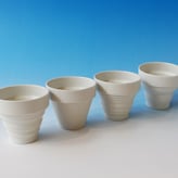 Beaker-Younker-set-of-4-porcelain-h.7xd.75cm.-1