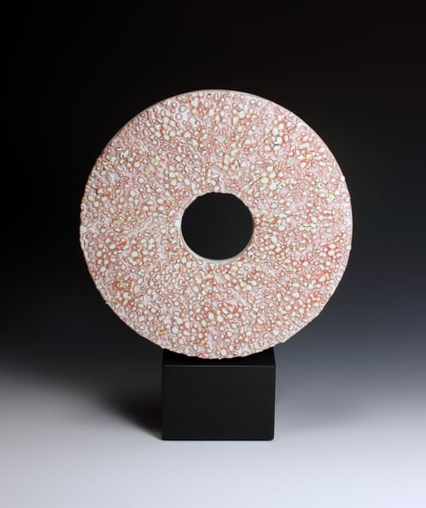 PB20-11-Red-yellow-and-black-ground-disc-on-stone-base-h.35-inc-basexd.26x8deep-base-TerraDelft