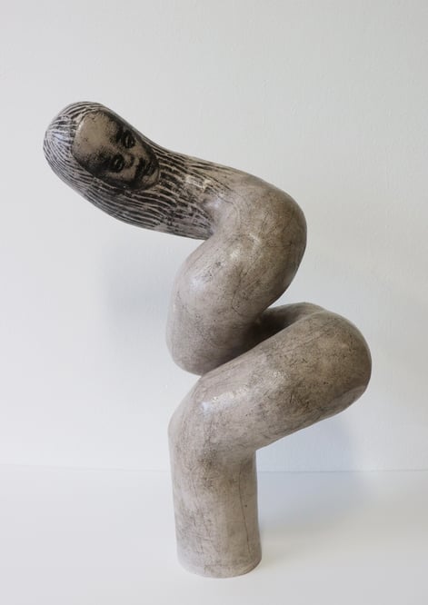 -Swirl-, 2024, h.48x23x28cm, handbuilt stoneware, lithographic deco, patina with body stains and metal oxides